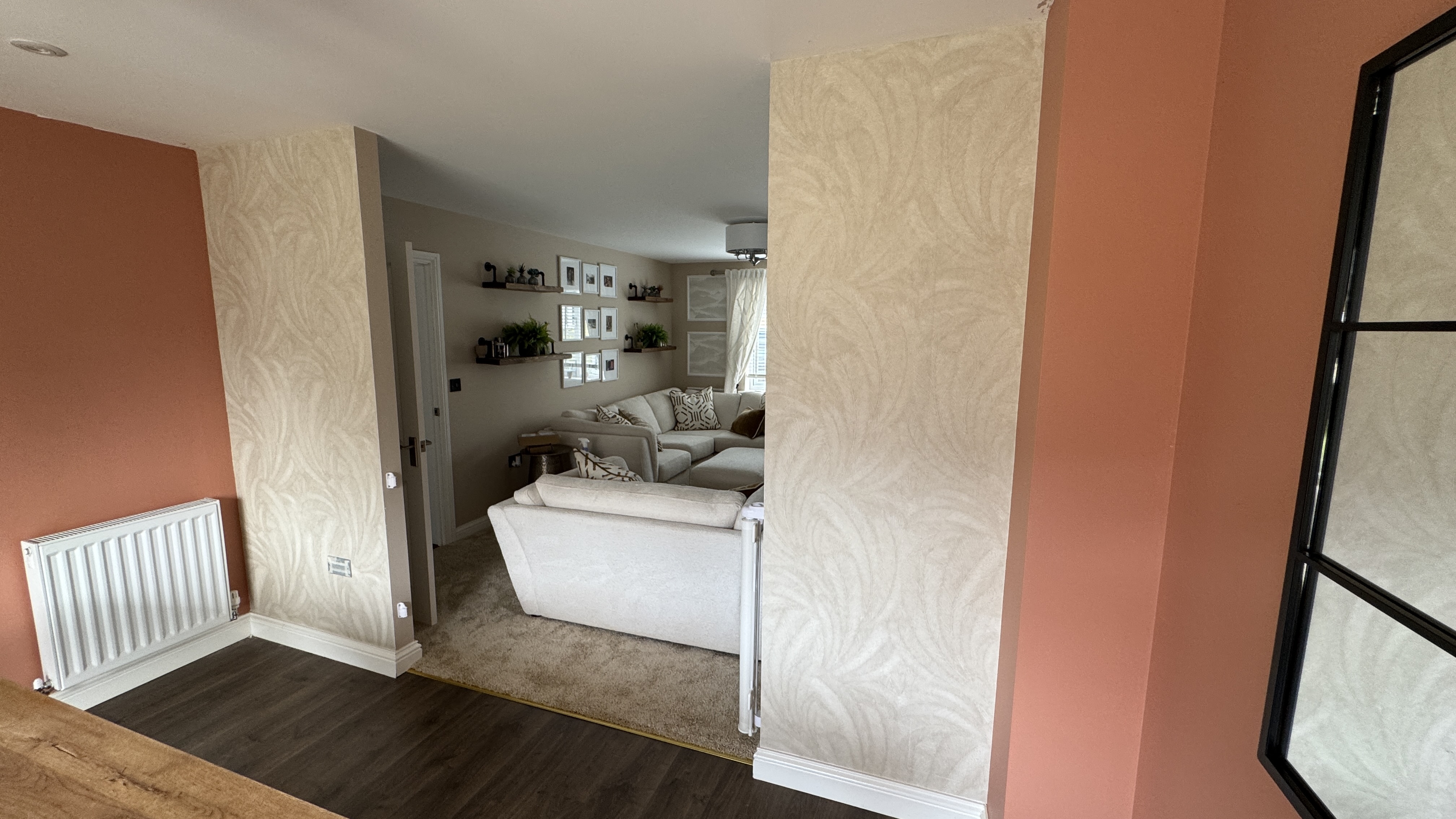 Statement wallpaper installed in living room